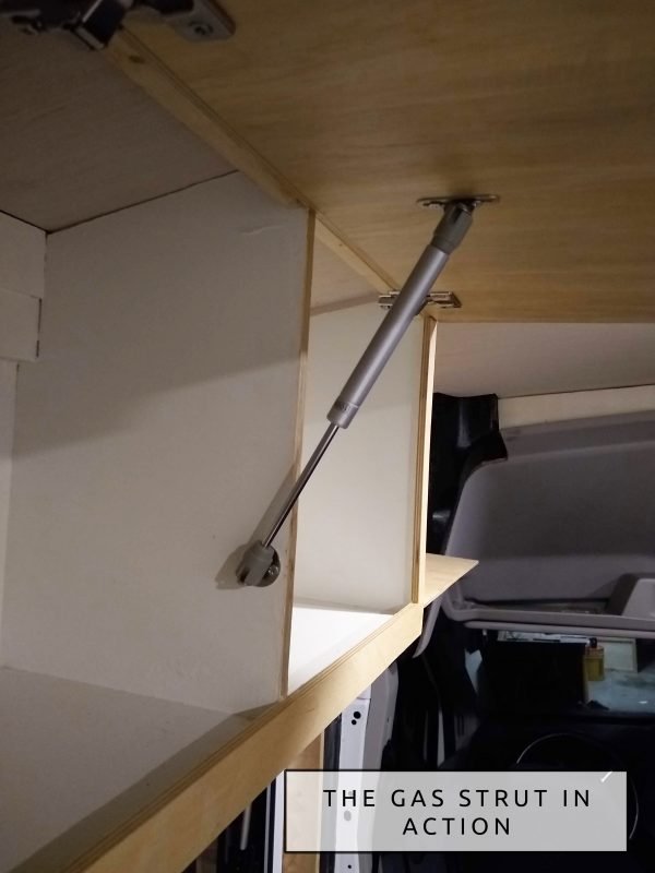 DIY Camper Van Conversion Upper Cabinets Hinges and Gas Strut Closeup